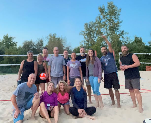 Steve with his sand volleyball team.